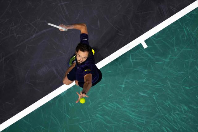 Russia's Daniil Medvedev serves to Spain's Jaume Munar during their men's singles match on day two of the Paris ATP Masters 1000 tennis tournament at the Paris La Defense Arena in Nanterre, on the outskirts of Paris, on October 28, 2025. (Photo by Sébastien DUPUY / AFP)