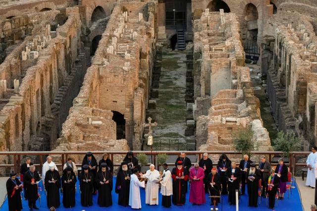 Pope Leo XIV attends an inter-religious meeting to pray for peace inside the Colosseum in Rome, on October 28, 2025 at the Colosseum in Rome. (Photo by Gregorio Borgia / POOL / AFP)