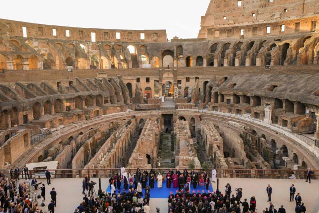 TOPSHOT - Pope Leo XIV attends an inter-religious meeting to pray for peace inside the Colosseum in Rome, on October 28, 2025. (Photo by Gregorio Borgia / POOL / AFP)