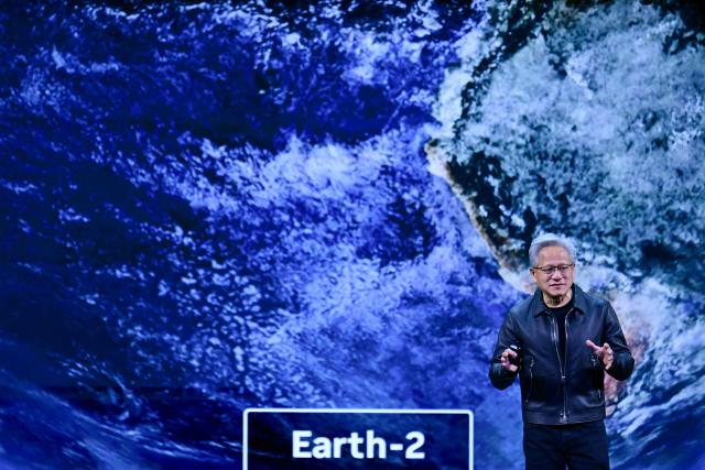 NVIDIA CEO Jensen Huang speaks during the Live Keynote Pregame during the Nvidia GTC (GPU Technology Conference) in Washington, DC, on October 28, 2025. (Photo by Jim WATSON / AFP)