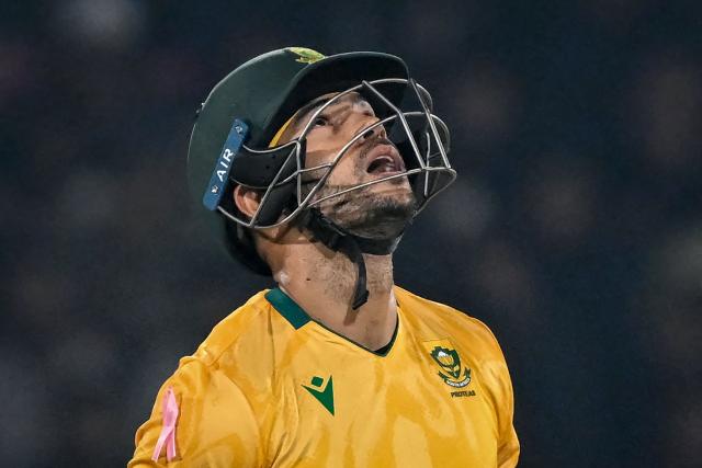 South Africa's Reeza Hendricks gestures as he celebrates after scoring a half-century (50 runs) during the first Twenty20 international cricket match between Pakistan and South Africa at Rawalpindi Cricket Stadium in Rawalpindi on October 28, 2025. (Photo by Farooq NAEEM / AFP)