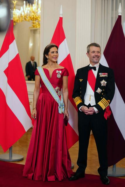 Denmark's King Frederik and Queen Mary poses as they arrive for the State dinner at Riga Castle on October 28, 2025 during the two-day state visit to Latvia. (Photo by Gints Ivuskans / AFP)