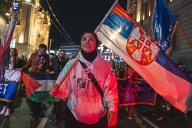 Students arrive in Belgrade late on October 28, 2025, after almost two weeks of marching from the southwestern city of Novi Pazar on their way to Novi Sad, where they plan to arrive on November 1. Nearly one year ago, on November 1, 2024, a railway station canopy collapsed in Serbia's second city of Novi Sad, killing 16 people and triggering huge demonstrations. (Photo by Andrej ISAKOVIC / AFP)