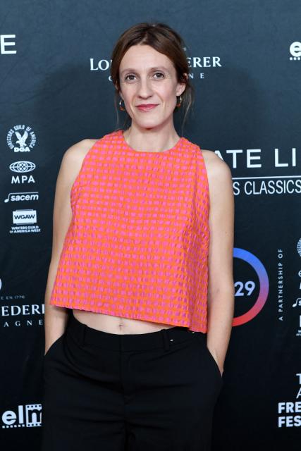 French director Pauline Loques attends the premiere of "A Private Life" on the opening night of The American French Film Festival (TAFFF) at the DGA Theater in Los Angeles, California on October 28, 2025. (Photo by Unique Nicole / AFP)
