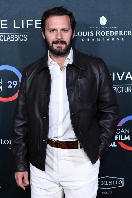 French actor Hugo Becker attends the premiere of "A Private Life" on the opening night of The American French Film Festival (TAFFF) at the DGA Theater in Los Angeles, California on October 28, 2025. (Photo by Unique Nicole / AFP)