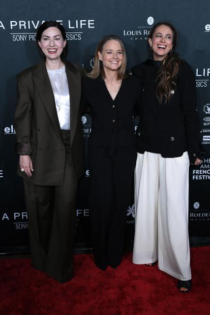 (L-R) French director Rebecca Zlotowski, US actress Jodie Foster and French writer Anne Berest attend the premiere of their movie "A Private Life" on the opening night of The American French Film Festival (TAFFF) at the DGA Theater in Los Angeles, California on October 28, 2025. (Photo by Unique Nicole / AFP)