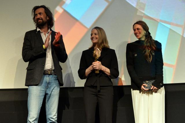 (L-R) French composer Robin Coudert, US actress Jodie Foster and French writer Anne Berest attend the premiere of their movie "A Private Life" on the opening night of The American French Film Festival (TAFFF) at the DGA Theater in Los Angeles, California on October 28, 2025. (Photo by Unique NICOLE / AFP)