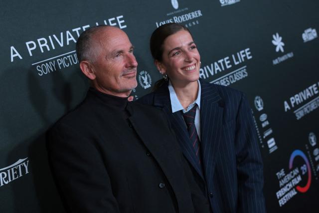Executive Producer of The American French Film Festival (TAFFF) Francois Truffart (L) and the Deputy Director Anouchka van Riel attend the premiere of "A Private Life" on the opening night of The American French Film Festival (TAFFF) at the DGA Theater in Los Angeles, California on October 28, 2025. (Photo by Etienne LAURENT / AFP)