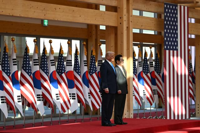 South Korean President Lee Jae Myung and US President Donald Trump attend an arrival ceremony at the Gyeongju National Museum in Gyeongju on October 29, 2025. (Photo by ANDREW CABALLERO-REYNOLDS / AFP)