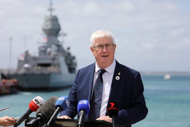 Christopher Gardner, CEO of the British Submarine Delivery Agency, addresses the media following the arrival of the USS Vermont (SSN-792), a US Virginia-class nuclear-powered attack submarine, at HMAS Stirling in Perth on October 29, 2025. The USS Vermont arrived for a Submarine Maintenance Period (SMP), marking progress under the AUKUS partnership towards establishing the Submarine Rotational Force–West. (Photo by Antony DICKSON / AFP)