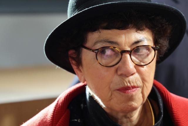 France's Minister of Ecological Transition, Biodiversity and International Negotiations on Climate a Monique Barbut looks on during the opening session of the 8th Paris Peace Forum at the Palais Brongniart in Paris, on October 29, 2025. Over 300 participants including business, government and international organization leaders, academics and civil society members are meeting in Paris' Palais de Chaillot to discuss the issues of conflict resolution, climate and peace, marking the 10th anniversary of the Paris Agreement. (Photo by Ludovic MARIN / AFP)