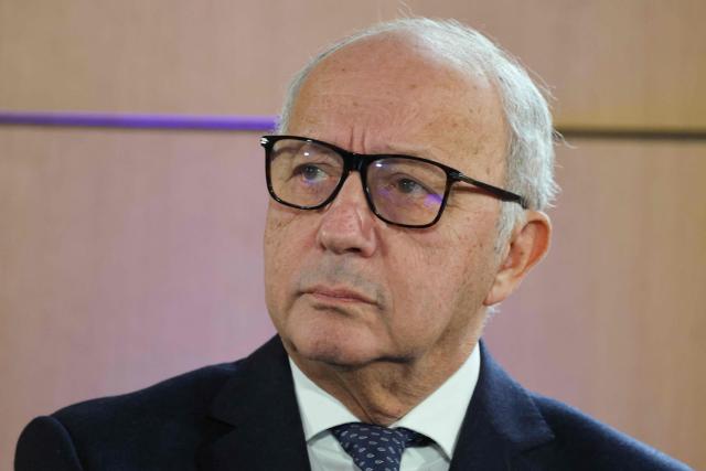 Former President of the Constitutional council Laurent Fabius looks on during the opening session of the 8th Paris Peace Forum at the Palais Brongniart in Paris, on October 29, 2025. Over 300 participants including business, government and international organization leaders, academics and civil society members are meeting in Paris' Palais de Chaillot to discuss the issues of conflict resolution, climate and peace, marking the 10th anniversary of the Paris Agreement. (Photo by Ludovic MARIN / AFP)