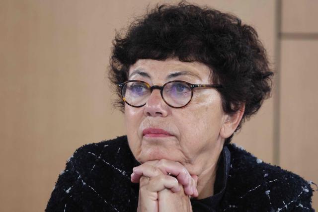 France's Minister of Ecological Transition, Biodiversity and International Negotiations on Climate a Monique Barbut looks on during the opening session of the 8th Paris Peace Forum at the Palais Brongniart in Paris, on October 29, 2025. Over 300 participants including business, government and international organization leaders, academics and civil society members are meeting in Paris' Palais de Chaillot to discuss the issues of conflict resolution, climate and peace, marking the 10th anniversary of the Paris Agreement. (Photo by Ludovic MARIN / AFP)