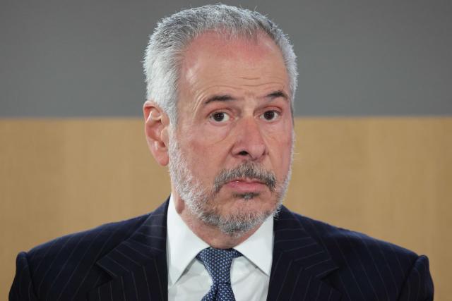 COP30 President-Designate, Andre Correa do Lago looks on during a round table session at the 8th Paris Peace Forum at the Palais Brongniart in Paris, on October 29, 2025. Over 300 participants including business, government and international organization leaders, academics and civil society members are meeting in Paris' Palais de Chaillot to discuss the issues of conflict resolution, climate and peace, marking the 10th anniversary of the Paris Agreement. (Photo by Ludovic MARIN / AFP)