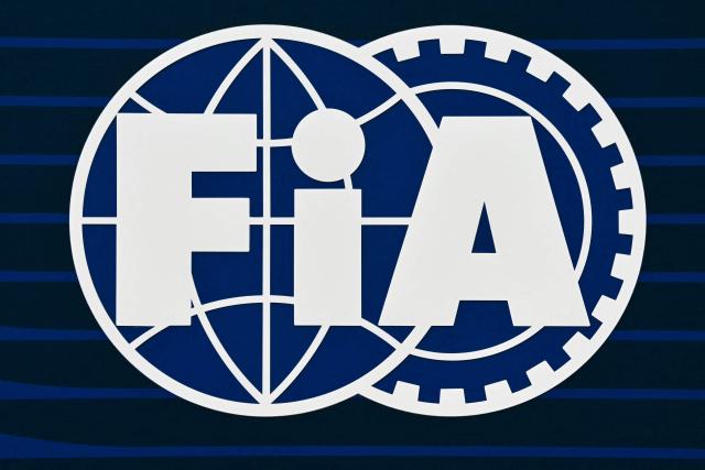 (FILES) A picture of the FIA logo on the first day of the Formula One pre-season testing at the Bahrain International Circuit in Sakhir on February 26, 2025. Swiss racing driver Laura Villars filed legal action on October 29, 2025 against motorsport's governing body to challenge the FIA election rules, which effectively prevent her or any other candidate from running against incumbent president Mohammed Ben Sulayem. (Photo by Giuseppe CACACE / AFP)