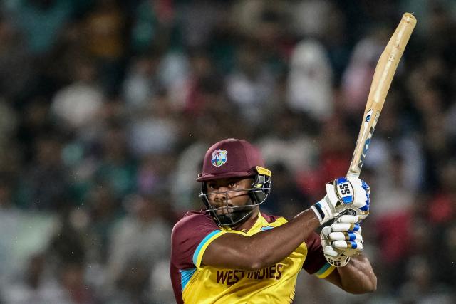 West Indies' Romario Shepherd plays a shot during the second Twenty20 international cricket match between Bangladesh and West Indies at the Bir Sreshtho Flight Lieutenant Matiur Rahman Stadium in Chittagong on October 29, 2025. (Photo by Munir UZ ZAMAN / AFP)
