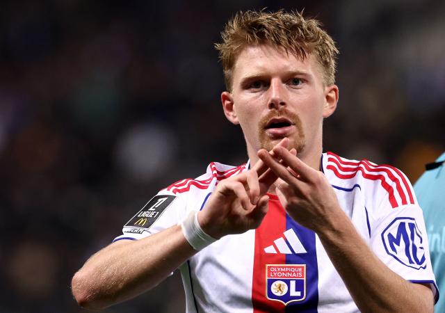 Lyon's Czech midfielder #10 Pavel Sulc celebrates scoring a goal during the ench L1 football match between RC Strasbourg Alsace and AJ Auxerre at the Stade de la Meinau in Strasbourg, eastern France, on October 29, 2025. (Photo by FRANCK FIFE / AFP)