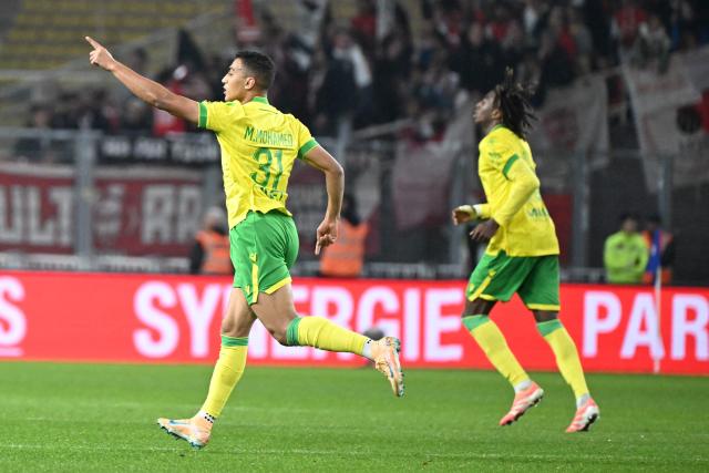 Nantes' Egyptian forward #31 Mostafa Mohamed celebrates scoring a goal during  the French L1 football match between FC Nantes and AS Monaco at the Stade de la Beaujoire-Louis Fonteneau in Nantes, western France, on October 29, 2025. (Photo by Sebastien Salom-Gomis / AFP)