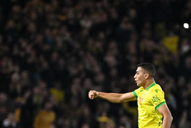 Nantes' Egyptian forward #31 Mostafa Mohamed celebrates scoring a goal during  the French L1 football match between FC Nantes and AS Monaco at the Stade de la Beaujoire-Louis Fonteneau in Nantes, western France, on October 29, 2025. (Photo by Sebastien Salom-Gomis / AFP)
