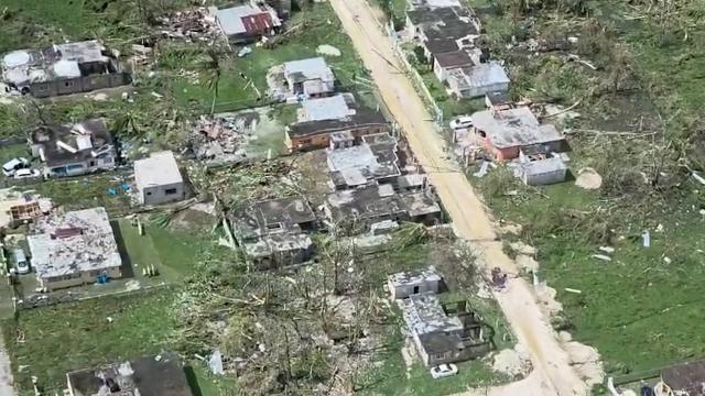 This screen grab from an aerial video shows damaged buildings and structures in St. Elizabeth Parish, Jamaica, on October 29, 2025, after Hurricane Melissa tore through the island. Hurricane Melissa ripped up trees and knocked out power after making landfall in Jamaica on October 28, 2025 as one of the most powerful hurricanes on record, inundating the island nation with rains that threaten flash floods and landslides. (Photo by AFP VIDEOGRAPHICS / AFP)