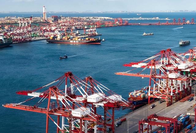 An aerial view shows the port in Qingdao, in China’s eastern Shandong province on October on October 29, 2025. (Photo by AFP) / China OUT