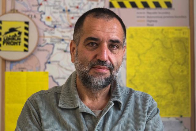 Activist Predrag Vostinic of the civic group Lokalni Front poses for a photo in the city of Kraljevo, Central Serbia, on October 21, 2025. Serbia is preparing to mark the first anniversary of the Novi Sad tragedy, which sparked some of the biggest protests in its history — a year that left the country deeply changed and polarised.
The train-station collapse in the country’s second-largest city, which killed 16 people just months after renovation, became a symbol of entrenched corruption — bringing hundreds of thousands to the streets under the "bloody hand" stencil that became its emblem. (Photo by Andrej ISAKOVIC / AFP)