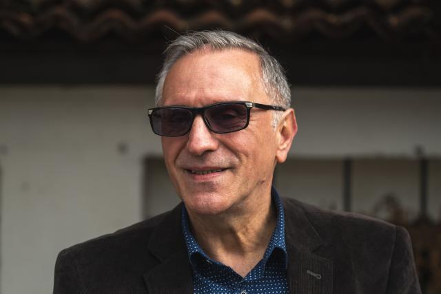 Sead Biberovic, head of the NGO Urban-IN, poses for a photo in the city of Novi Pazar, South-western Serbia, on October 22, 2025. Serbia is preparing to mark the first anniversary of the Novi Sad tragedy, which sparked some of the biggest protests in its history — a year that left the country deeply changed and polarised.
The train-station collapse in the country’s second-largest city, which killed 16 people just months after renovation, became a symbol of entrenched corruption — bringing hundreds of thousands to the streets under the "bloody hand" stencil that became its emblem, (Photo by Andrej ISAKOVIC / AFP)