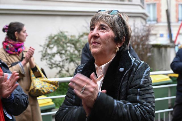 French midwife Chantal Birman attends a demonstration against the closing of the Lilas maternity hospital, in Les Lilas, northeastern suburb of Paris, on October 30, 2025. It has supported thousands of women across several generations during pregnancy and childbirth: after 60 years of activity, the Lilas maternity hospital (Seine-Saint-Denis) is closing its doors for financial reasons on October 31, 2025 at 8:00 PM, causing sadness and dismay among patients and staff. (Photo by Bertrand GUAY / AFP)