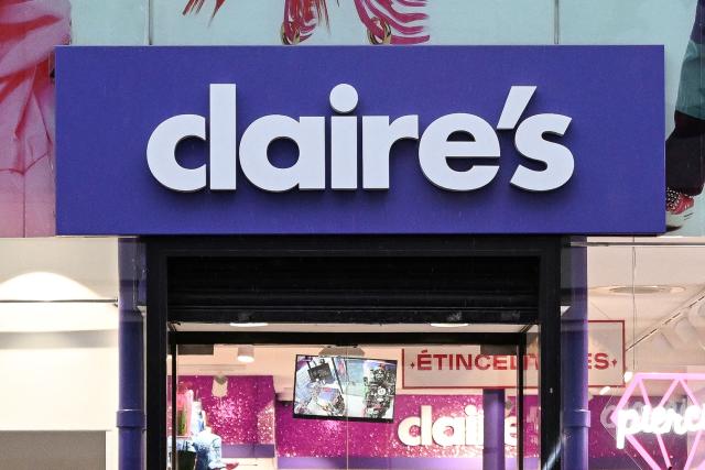 (FILES) This photograph shows a logo on a Claire's shop, a brand of accessories and affordable jewelry, on the first day of winter sales, in Paris, on January 8, 2025. Claire's France: two companies offered to take over the brand and 460 employees out of 829, staff lawyers told AFP on October 30, 2025. (Photo by Anna KURTH / AFP)