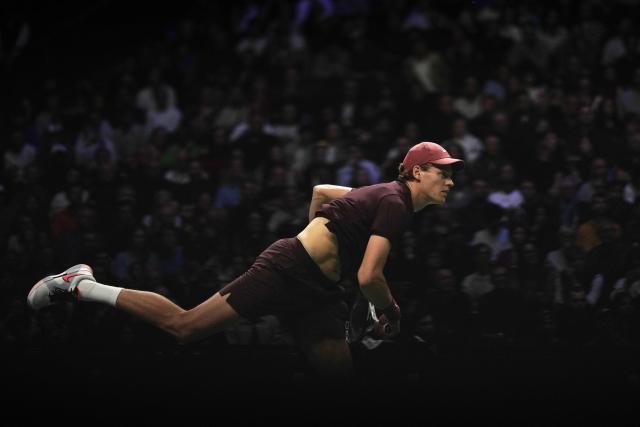 Italy's Jannik Sinner plays against Argentine's Francisco Cerundolo during their men's singles match on day four of the Paris ATP Masters 1000 tennis tournament at the Paris La Défense Arena in Nanterre, on the outskirts of Paris, on October 30, 2025. (Photo by Dimitar DILKOFF / AFP)