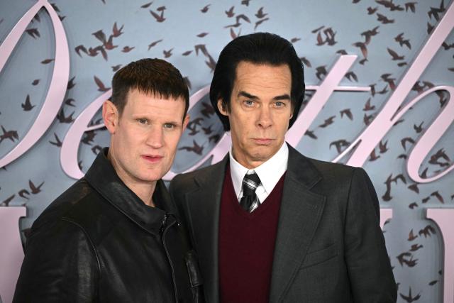 British actor Matt Smith (L) and Australian musician and author Nick Cave (R) pose on the red carpet upon arrival to attend the world premiere of TV series 'The Death of Bunny Munro', based on a novel by Nick Cave of the same name, at the Royal Festival Hall in London on October 30, 2025. (Photo by JUSTIN TALLIS / AFP)