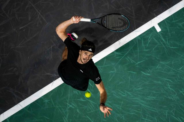 Germany's Alexander Zverev serves to Spain's Alejandro Davidovich Fokina during their men's singles match on day four of the Paris ATP Masters 1000 tennis tournament at the Paris La Défense Arena in Nanterre, on the outskirts of Paris, on October 30, 2025. (Photo by Dimitar DILKOFF / AFP)