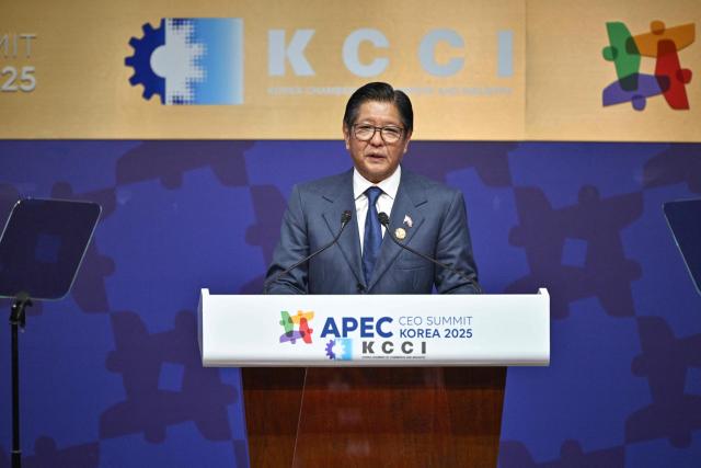 Philippines' President Ferdinand Marcos Jr delivers a speech during the Asia-Pacific Economic Cooperation (APEC) CEO Summit at the Gyeongju Arts Center in Gyeongju on October 31, 2025. (Photo by ANTHONY WALLACE / AFP)