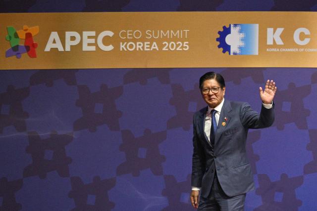 Philippines' President Ferdinand Marcos Jr leaves after delivering a speech during the Asia-Pacific Economic Cooperation (APEC) CEO Summit at the Gyeongju Arts Center in Gyeongju on October 31, 2025. (Photo by ANTHONY WALLACE / AFP)