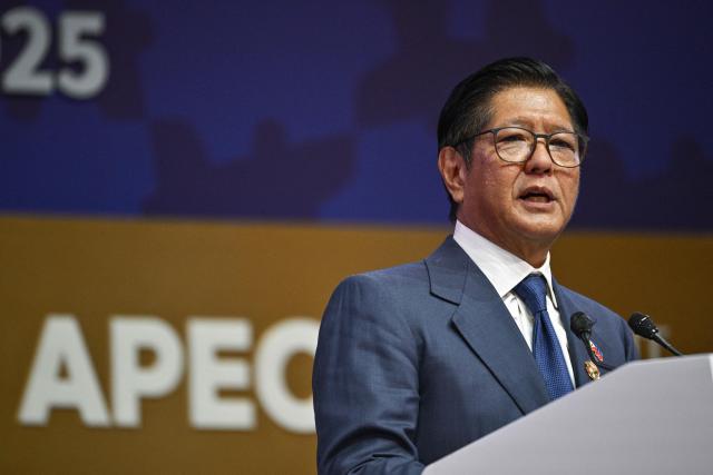 Philippines' President Ferdinand Marcos Jr delivers a speech during the Asia-Pacific Economic Cooperation (APEC) CEO Summit at the Gyeongju Arts Center in Gyeongju on October 31, 2025. (Photo by ANTHONY WALLACE / AFP)