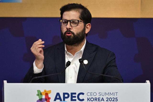Chile's President Gabriel Boric delivers a speech during the Asia-Pacific Economic Cooperation (APEC) CEO Summit at the Gyeongju Arts Center in Gyeongju on October 31, 2025. (Photo by ANTHONY WALLACE / AFP)