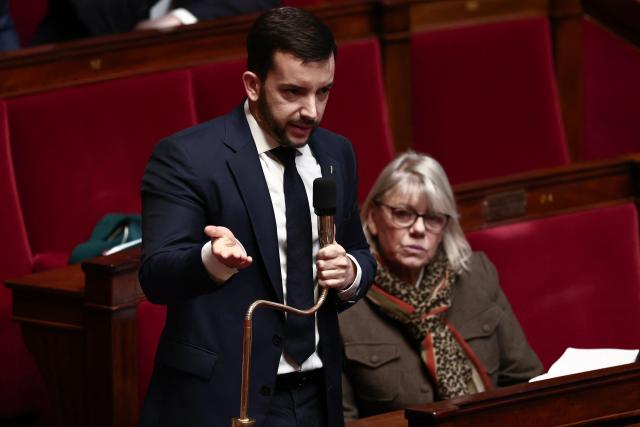 Rassemblement National's MP Jean-Philippe Tanguy speaks, flanked by Rassemblement National's MP Florence Goulet during a parliamentary debate on the 2026 budget at The National Assembly, France's lower house parliament, in Paris on October 31, 2025. (Photo by Thibaud MORITZ / AFP)