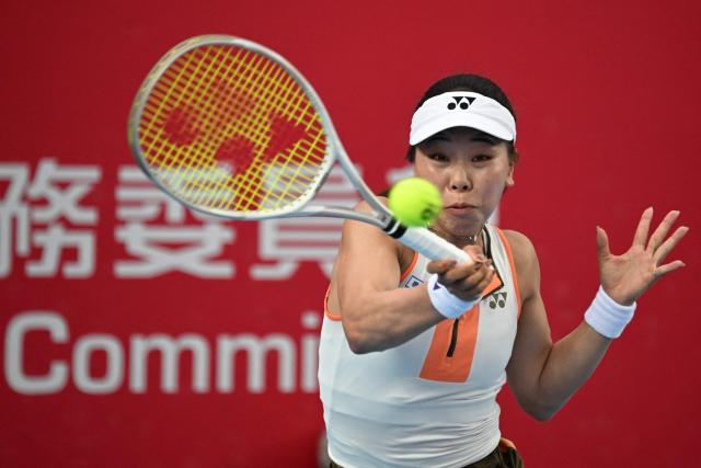 Japan's Himeno Sakatsume hits a return to Australia's Maya Joint during their women's singles quarter-final match in the Hong Kong Tennis Open in Hong Kong on October 31, 2025. (Photo by Peter PARKS / AFP)
