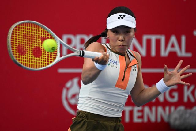 Japan's Himeno Sakatsume hits a return to Australia's Maya Joint during their women's singles quarter-final match in the Hong Kong Tennis Open in Hong Kong on October 31, 2025. (Photo by Peter PARKS / AFP)