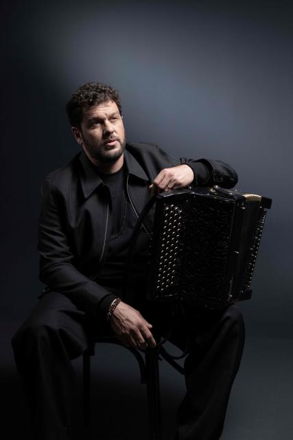 French singer Claudio Capeo poses during a photo session in Paris, on October 30, 2025. (Photo by Thibaud MORITZ / AFP)