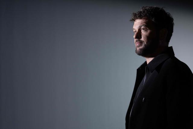 French singer Claudio Capeo poses during a photo session in Paris, on October 30, 2025. (Photo by Thibaud MORITZ / AFP)