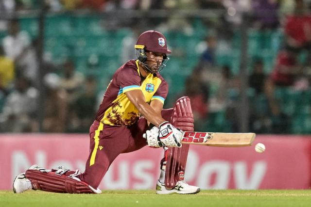 West Indies' captain Roston Chase plays a shot during the third Twenty20 international cricket match between Bangladesh and West Indies at the Bir Sreshtho Flight Lieutenant Matiur Rahman Stadium in Chittagong on October 31, 2025. (Photo by MUNIR UZ ZAMAN / AFP)