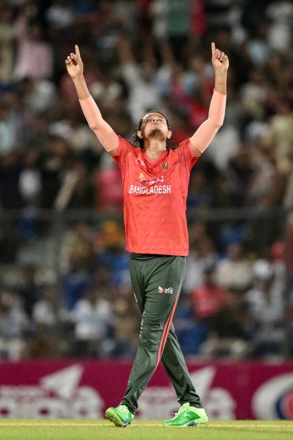 Bangladesh's Nasum Ahmed celebrates after taking the wicket of West Indies' Brandon King during the third Twenty20 international cricket match between Bangladesh and West Indies at the Bir Sreshtho Flight Lieutenant Matiur Rahman Stadium in Chittagong on October 31, 2025. (Photo by MUNIR UZ ZAMAN / AFP)