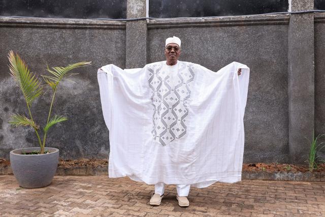 (FILES) Issa Tchiroma Bakary, 78, nominated as a presidential candidate by the Cameroon National Salvation Front (FNSC) poses for a picture at his home in Yaounde on August 25, 2025. Opposition leader Issa Tchiroma Bakary, who claims victory in the Cameroonian presidential election, asserted on October 31, 2025 that he is under the "protection" of a faction of the army and called for support through general strikes in the country, which has been rocked by unrest since Paul Biya's re-election.
On October 27, 2025 President Paul Biya, 92, who has been in power since 1982 in this Central African nation, was re-elected for an eighth term. His contested re-election has created a climate of tension in Cameroon, as several cities across the country have since been rocked by demonstrations called for by candidate Tchiroma, which have been violently suppressed by the regime. (Photo by Daniel BELOUMOU OLOMO / AFP)