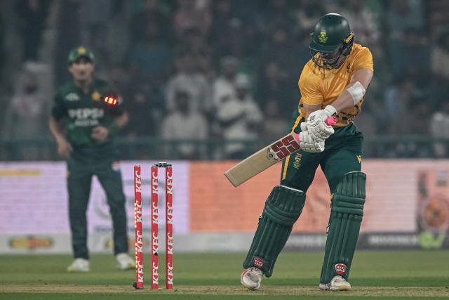 South Africa's Matthew Breetzke is clean bowled by Pakistan's Salman Mirza during the second Twenty20 international cricket match between Pakistan and South Africa at Gaddafi Stadium in Lahore on October 31, 2025. (Photo by Farooq NAEEM / AFP)