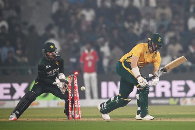 South Africa's Nandre Burger is clean bowled during the second Twenty20 international cricket match between Pakistan and South Africa at Gaddafi Stadium in Lahore on October 31, 2025. (Photo by Farooq NAEEM / AFP)