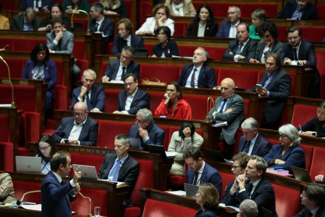 France's Prime Minister Sebastien Lecornu (bottom L) speaks during a parliamentary debate on the 2026 budget at The National Assembly, France's lower house parliament, in Paris on October 31, 2025. (Photo by ALAIN JOCARD / AFP)