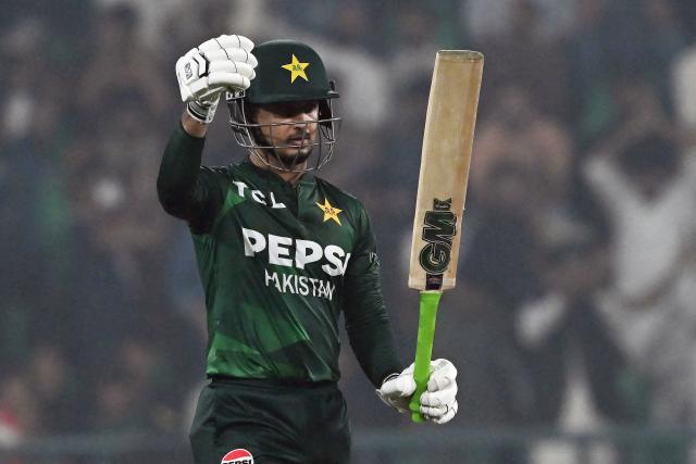 Pakistan's Saim Ayub celebrates his half century (50 runs) during the second Twenty20 international cricket match between Pakistan and South Africa at the Gaddafi Cricket Stadium in Lahore on October 31, 2025. (Photo by Farooq NAEEM / AFP)