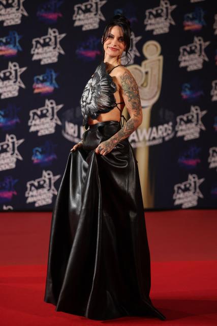 French streamer Maghla poses upon arrival on the red carpet to attend the 27th edition of the NRJ Music Awards ceremony at the Palais des Festivals, in Cannes, southeastern France, on October 31, 2025. (Photo by Valery HACHE / AFP)
