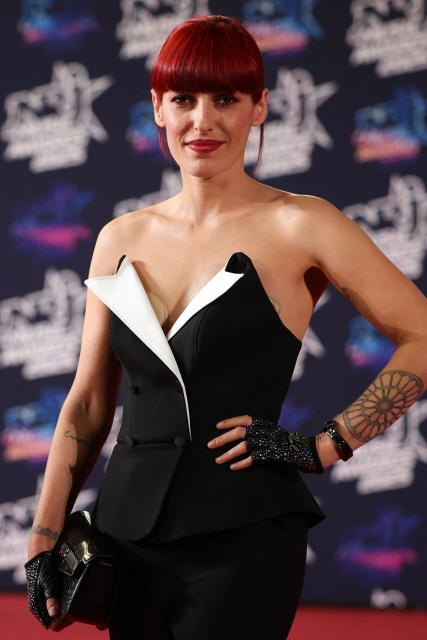 French singer c poses upon arrival on the red carpet upon arrival to attend the 27th edition of the NRJ Music Awards ceremony at the Palais des Festivals, in Cannes, southeastern France, on October 31, 2025. (Photo by Valery HACHE / AFP)